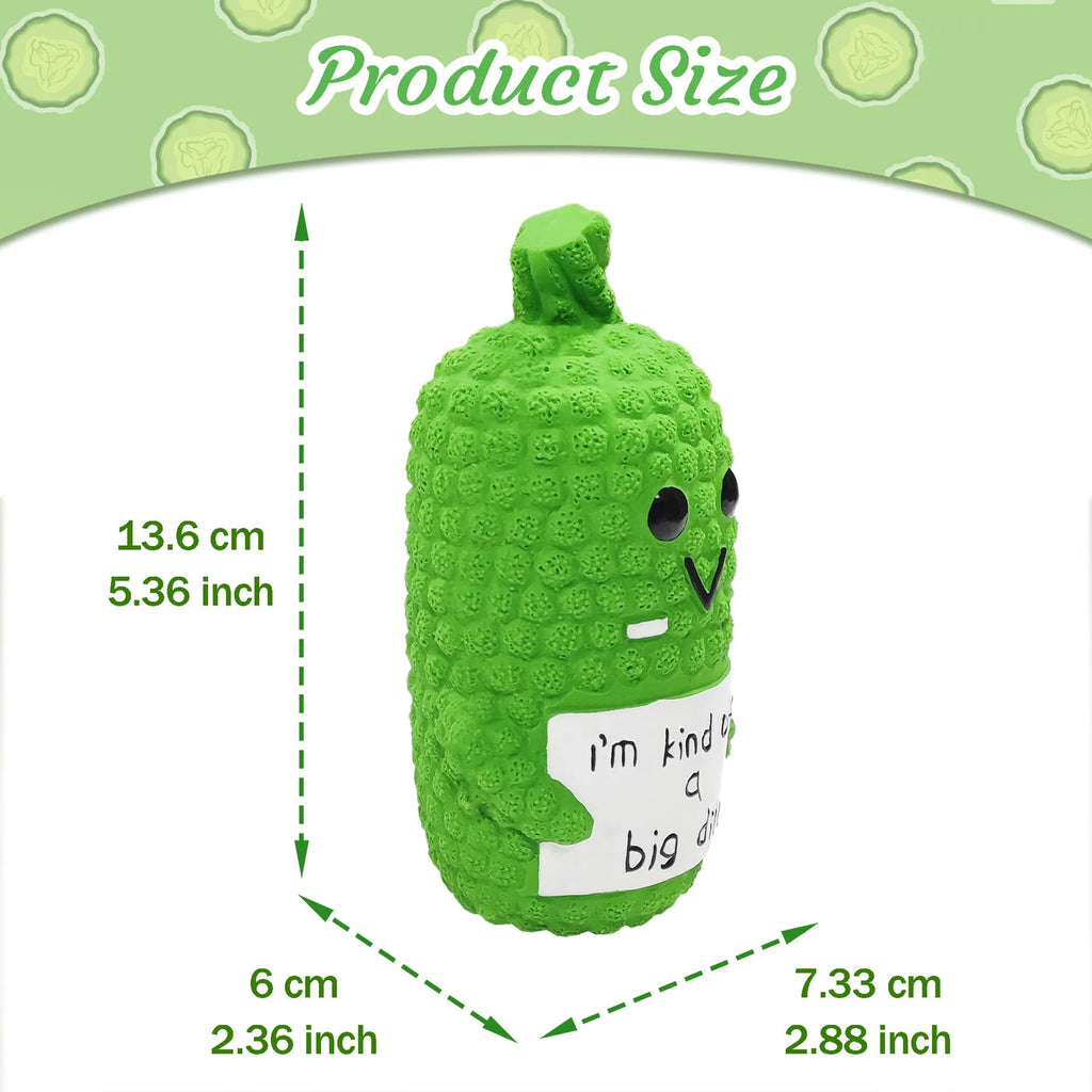 Green pickle-shaped latex dog chew toy with textured exterior and squeaker