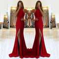 A long red evening dress with a high waist, large swing skirt, and hollow knit texture detail on the bodice.