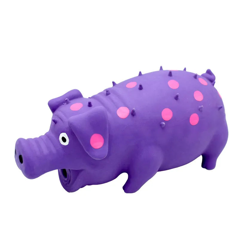Pig-shaped latex dog chew toy with squeaker in various colours, 20cm long