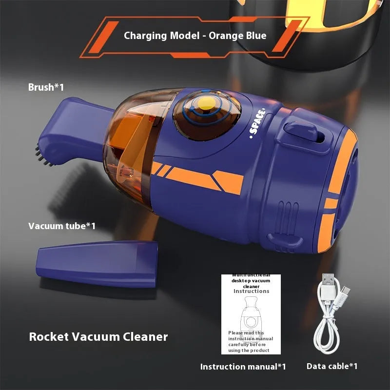 USB handheld desktop vacuum cleaner in blue rocket design on a wooden desk
