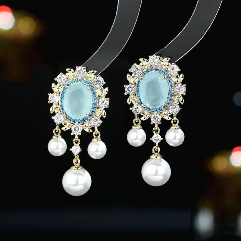 Oval geometric copper earrings with inlaid zircon stones and pearl tassel drops in light purple colour