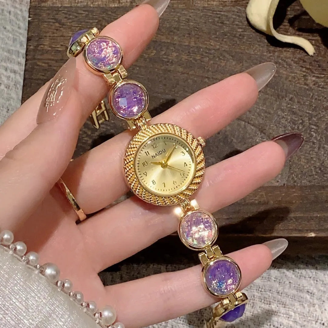 Women's quartz watch with 25mm round dial in choice of six colours on wrist.