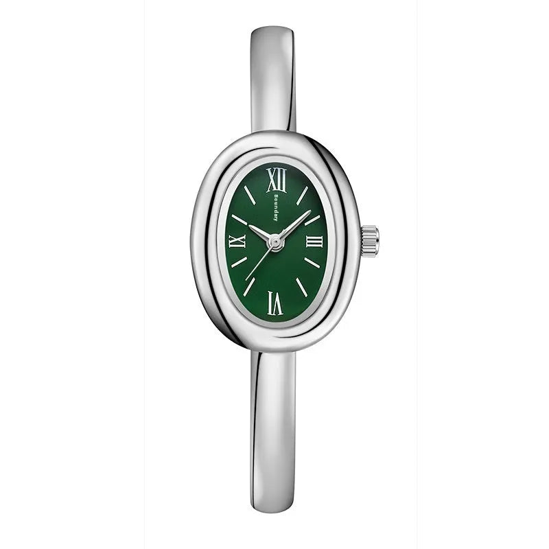 Women's oval retro quartz watch with 8mm thickness showing gold and silver colour options with spiral patterns