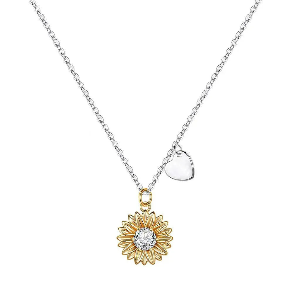 925 sterling silver sunflower necklace with daisy petal detail on an adjustable cross chain