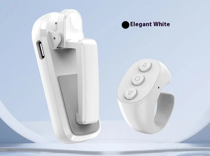 Smart wireless page turner remote with clicker accessory in black, white, or pink colours.