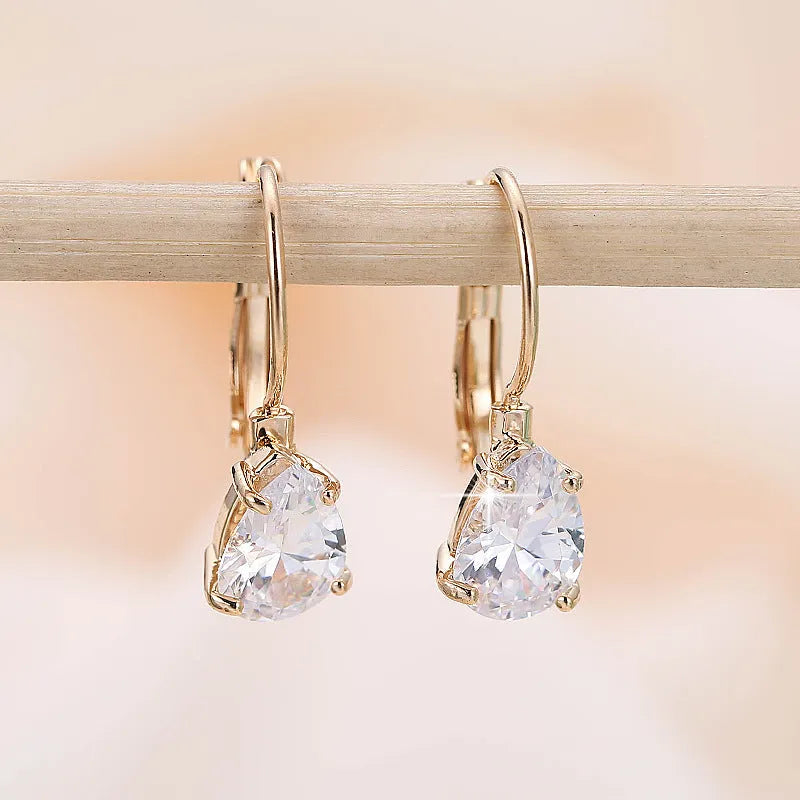 Women's metal drop earrings with gemstone accents in gold or platinum plating options