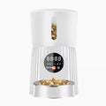 Black automatic pet feeder with food container and digital display