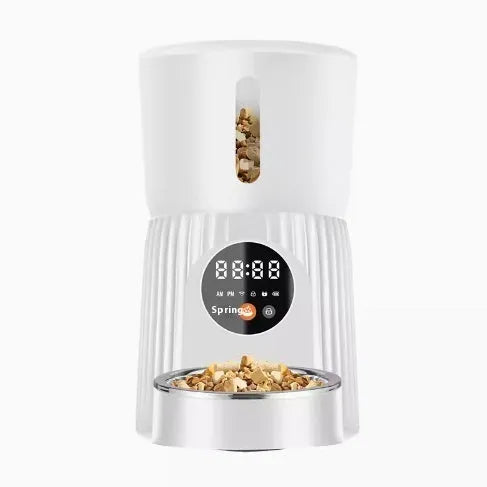 Black automatic pet feeder with food container and digital display