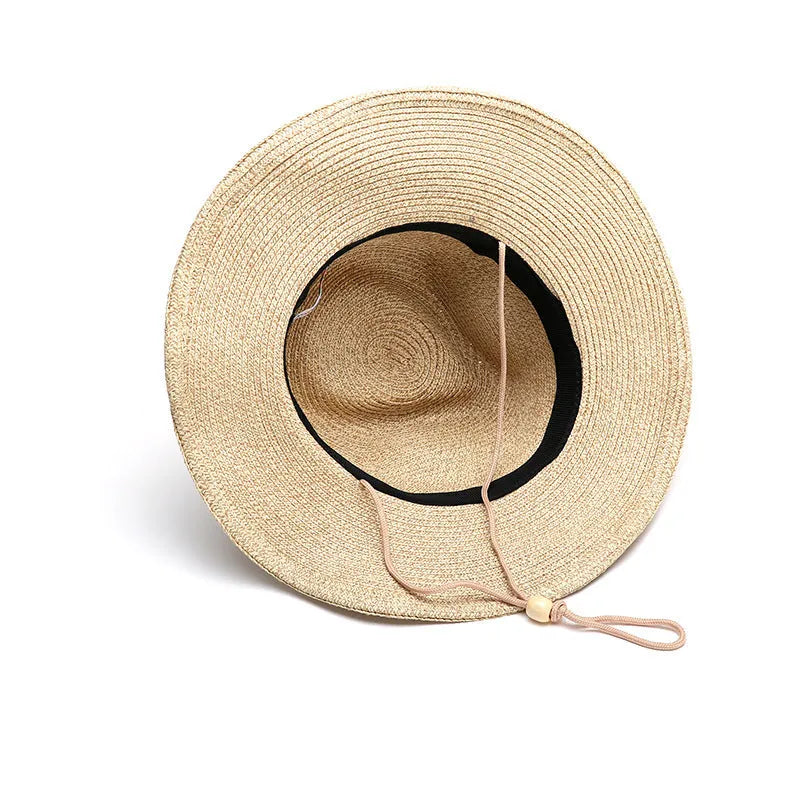 Men's foldable wide brim straw hat in mixed beige colour shown from side angle