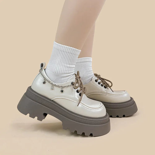 White Amy And Mai PU leather Mary Jane platform shoes with chunky heel and lace-up front.