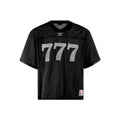 Retro style loose summer T-shirt in black, shown front-on on a hanger.