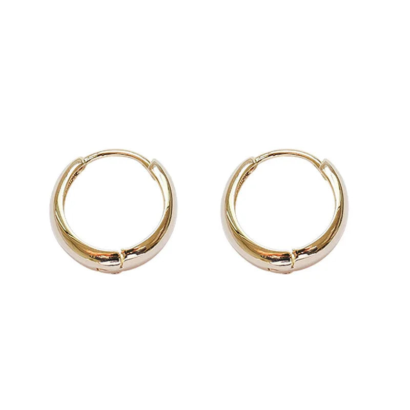 Women's retro minimalist geometric water drop earrings in gold and silver, shown in large, medium, and small sizes.