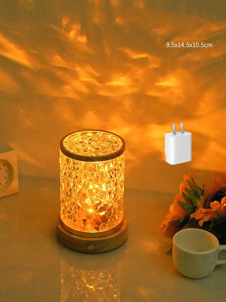 Small rotating water ripple night light with acrylic shade on solid wood base