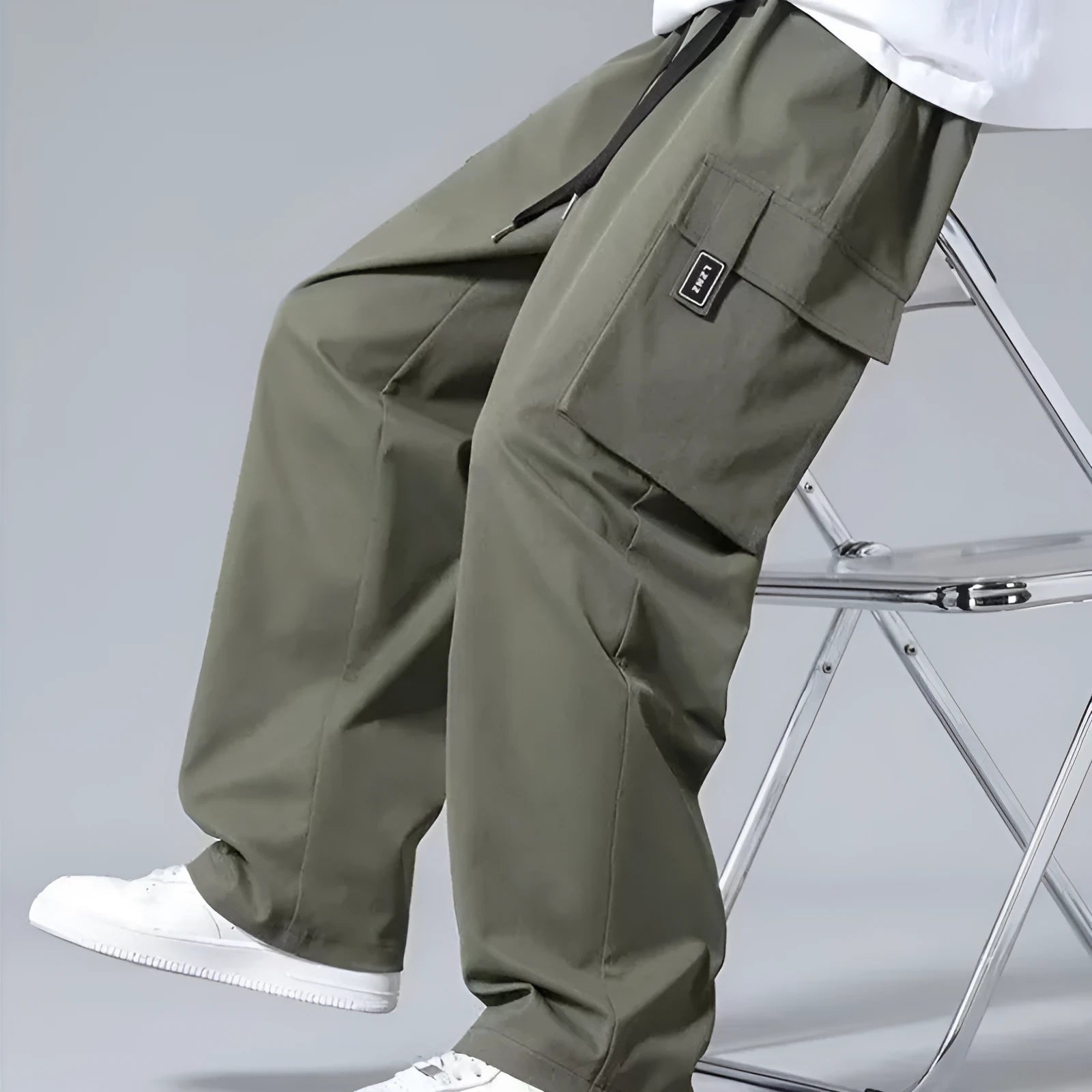 Boys straight leg cargo pants in Army Green with large pockets and a drawstring waist