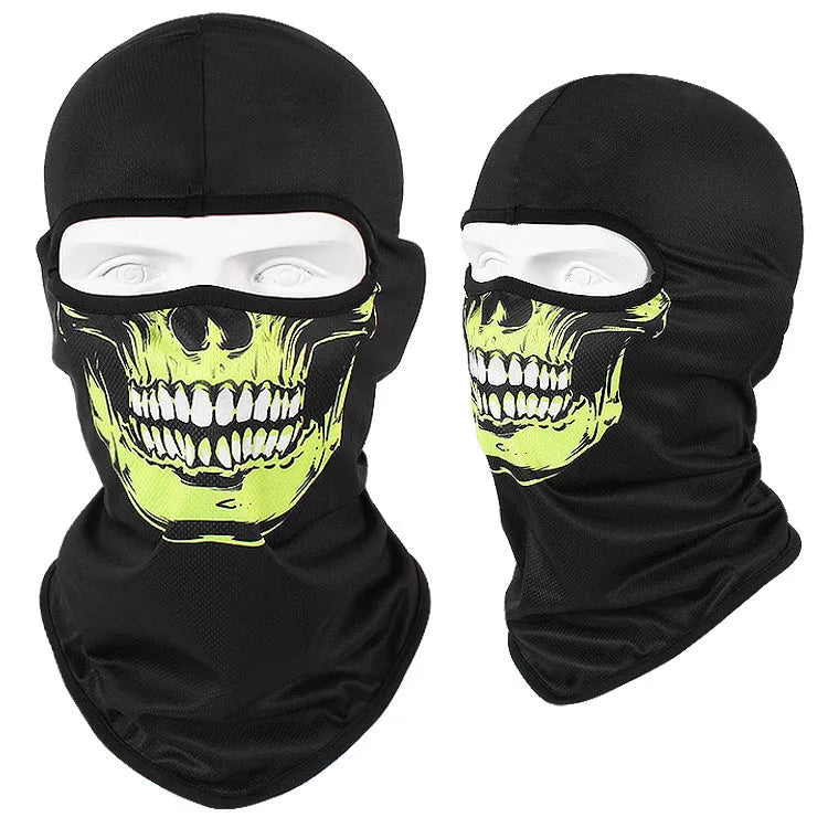 Breathable Bakool silk motorcycle skull mask in a graphic design, laid flat showing its 36cm by 29cm size.