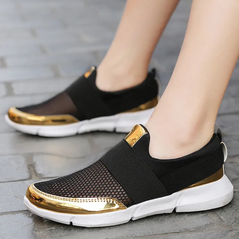 Blue, black, and grey women's low-cut sneakers with breathable mesh and a PU midsole