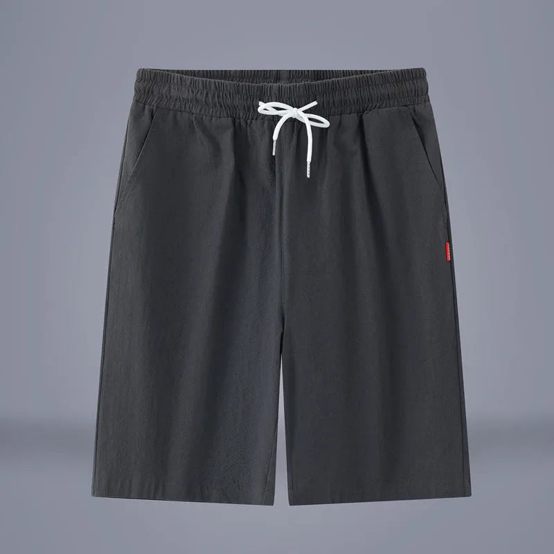 Cotton-linen blend cropped pants in a solid colour with a drawstring waist, shown in a mid-length cut.