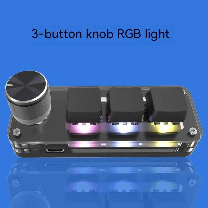 Black and white programmable macro keyboard with RGB backlighting showing copy paste shortcut keys