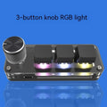 Black and white programmable macro keyboard with RGB backlighting showing copy paste shortcut keys