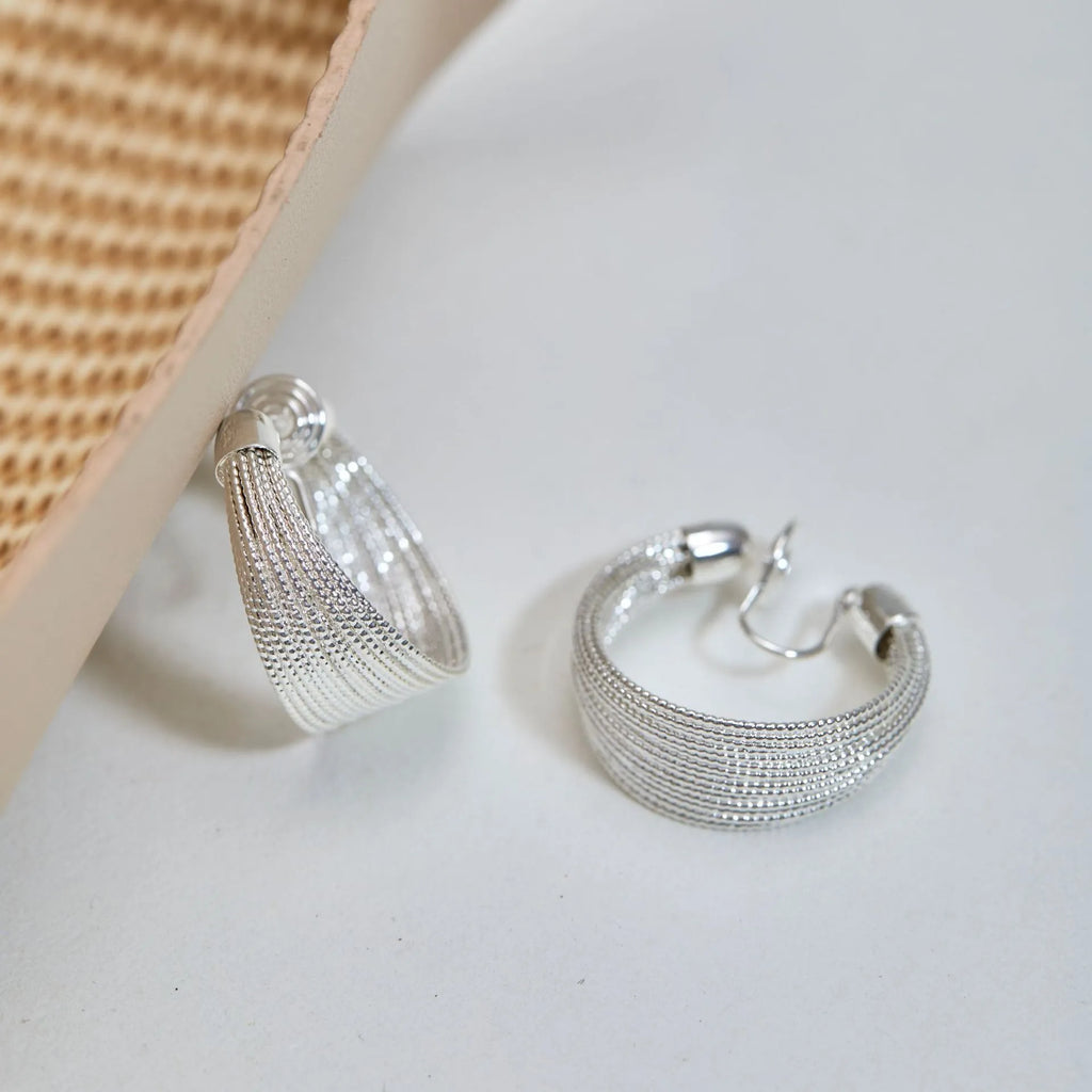 Geometric multi-layer bracelet earrings set with silver and gold colour pairs on copper