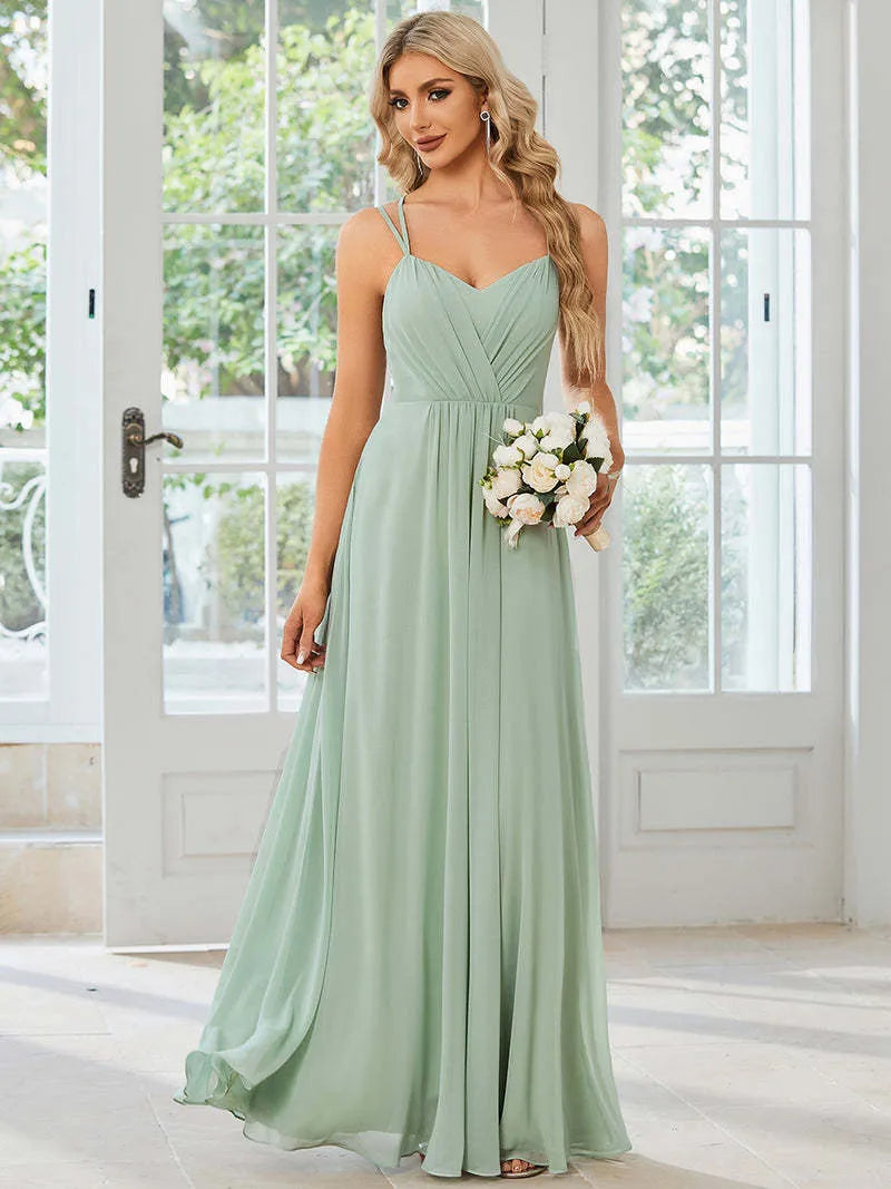 Women's sleeveless long A-line pleated dress in solid colour polyester fabric