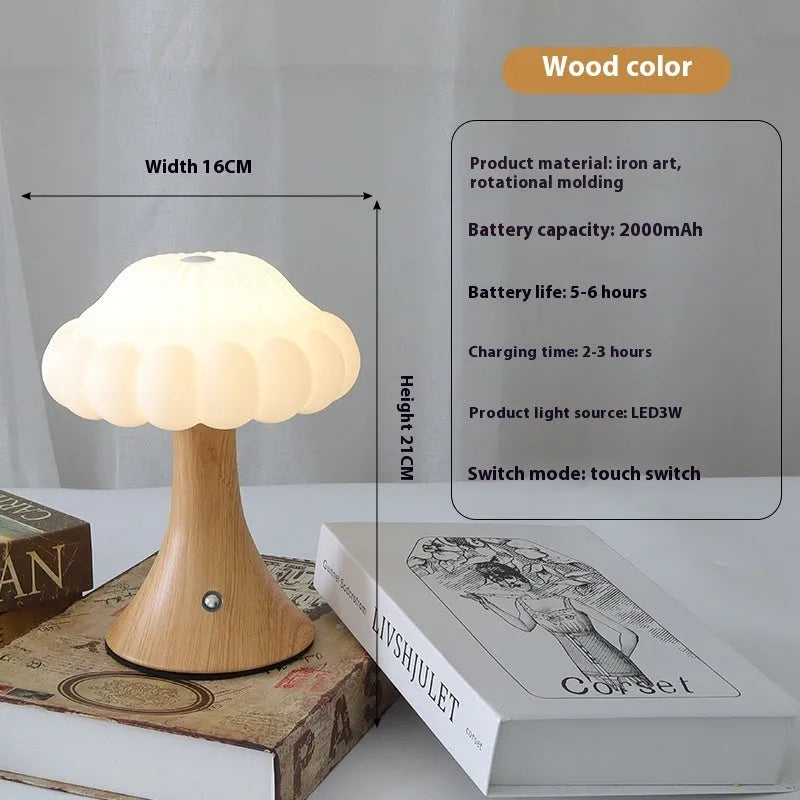 Small mushroom-shaped touch control night light in wood grain finish on a wooden table