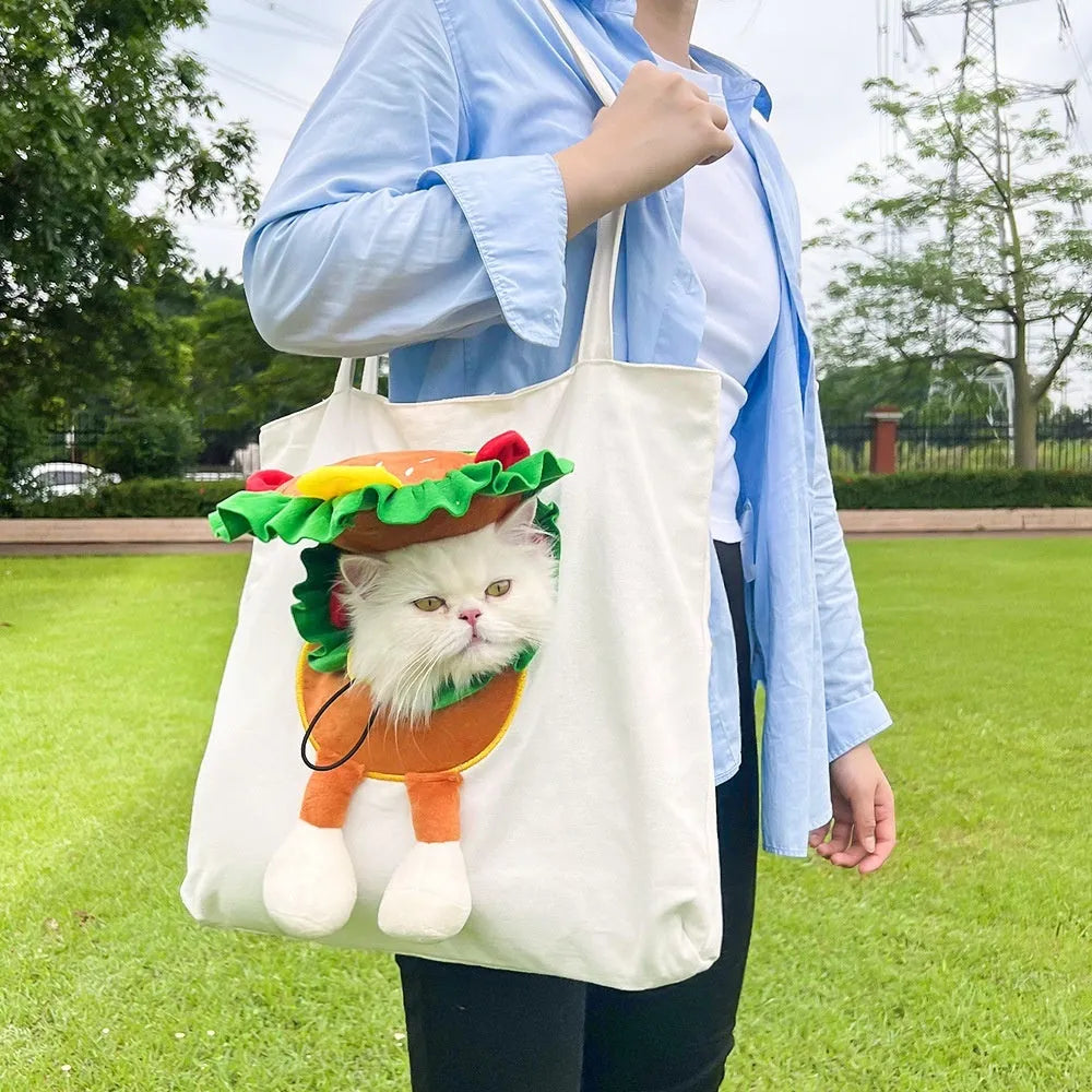 Soft canvas pet shoulder bag with cartoon pattern for small dog or cat carrier.
