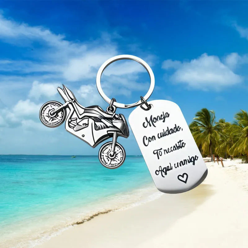 Stainless steel motorcycle key chain with inspirational design and included flannel storage bag