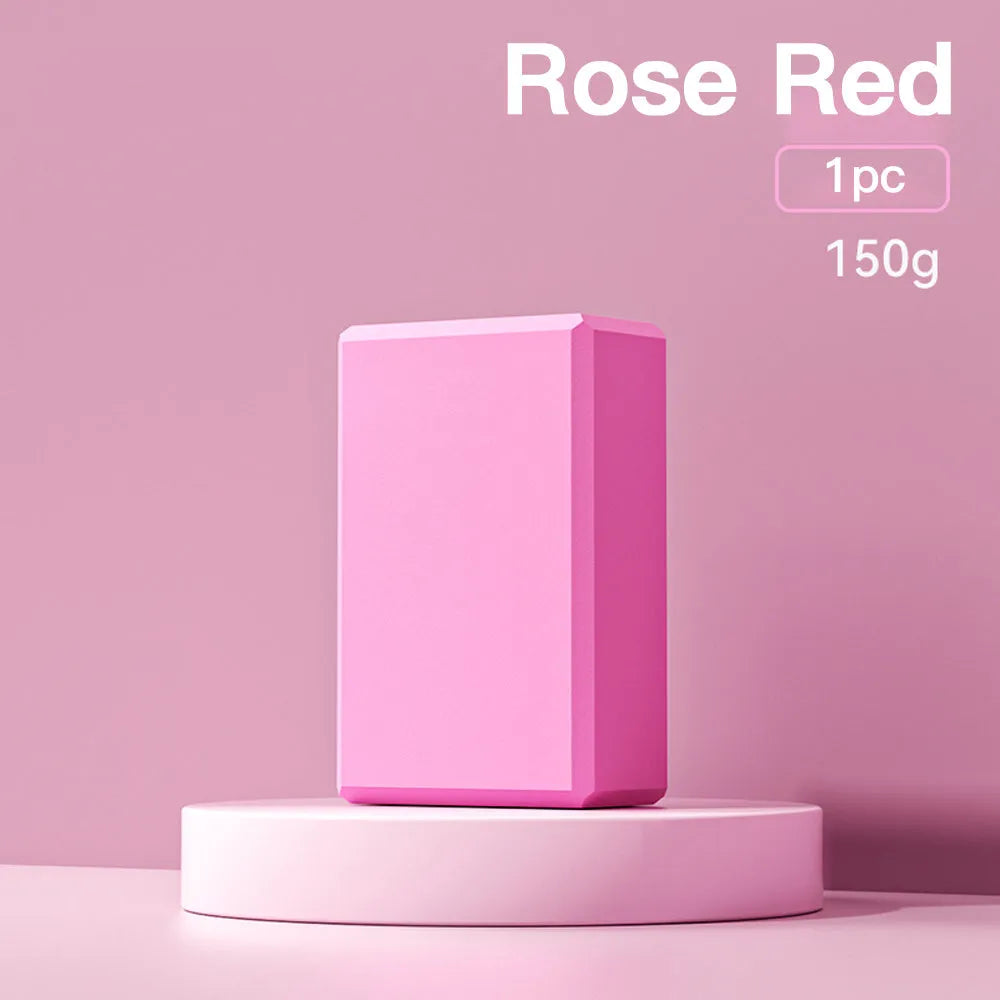 Solid colour EVA foam yoga block measuring 23x15x7.6cm with textured ridges for grip