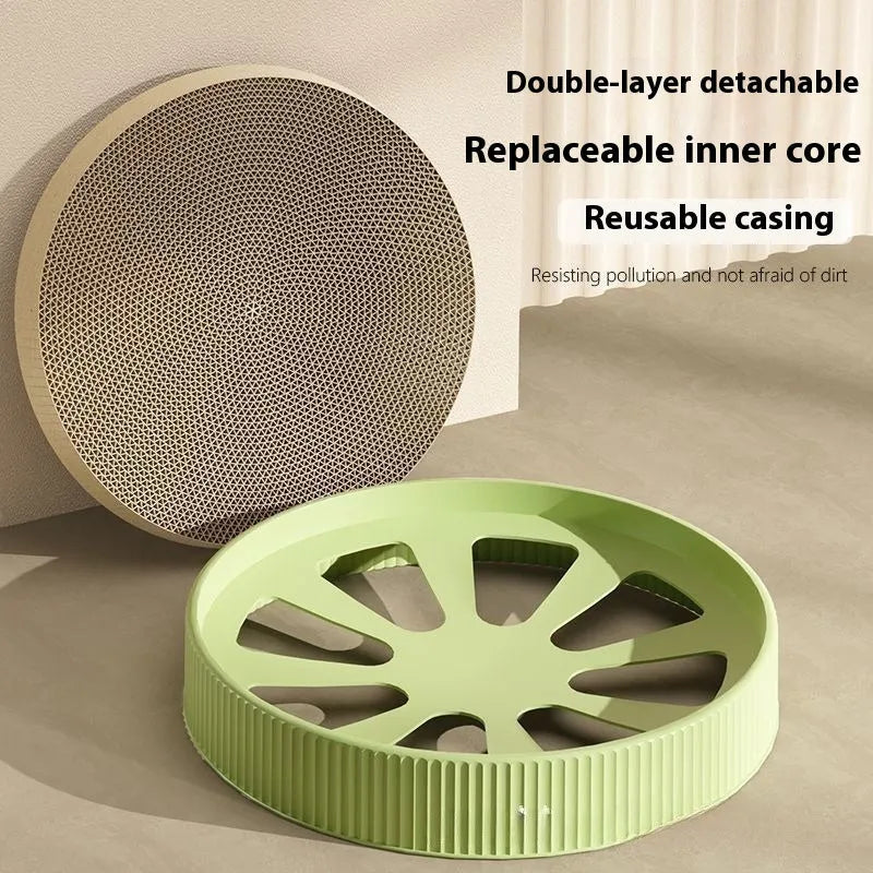 Green and white round cat scratching board with corrugated paper centre measuring 55 cm diameter