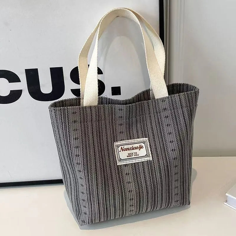 Japanese style large corduroy shoulder bag in dark brown colour showing textured fabric and casual design.