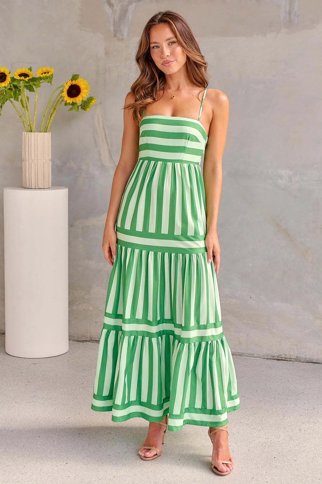Women's striped backless summer dress with suspender straps and side pockets in polyester spandex fabric