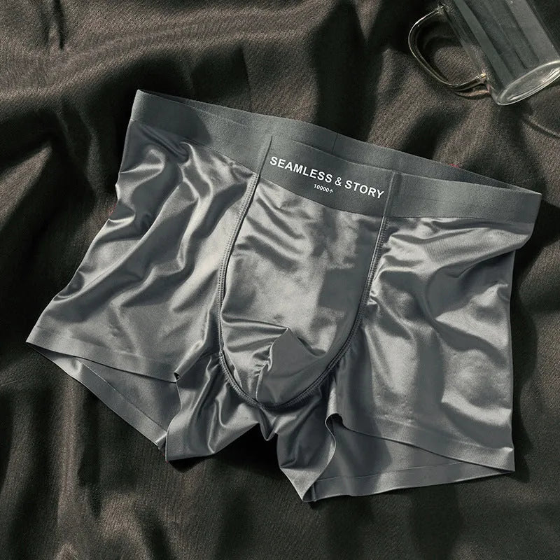 Men's ice silk underwear in satin finish showing mid-waist traceless design in coffee colour