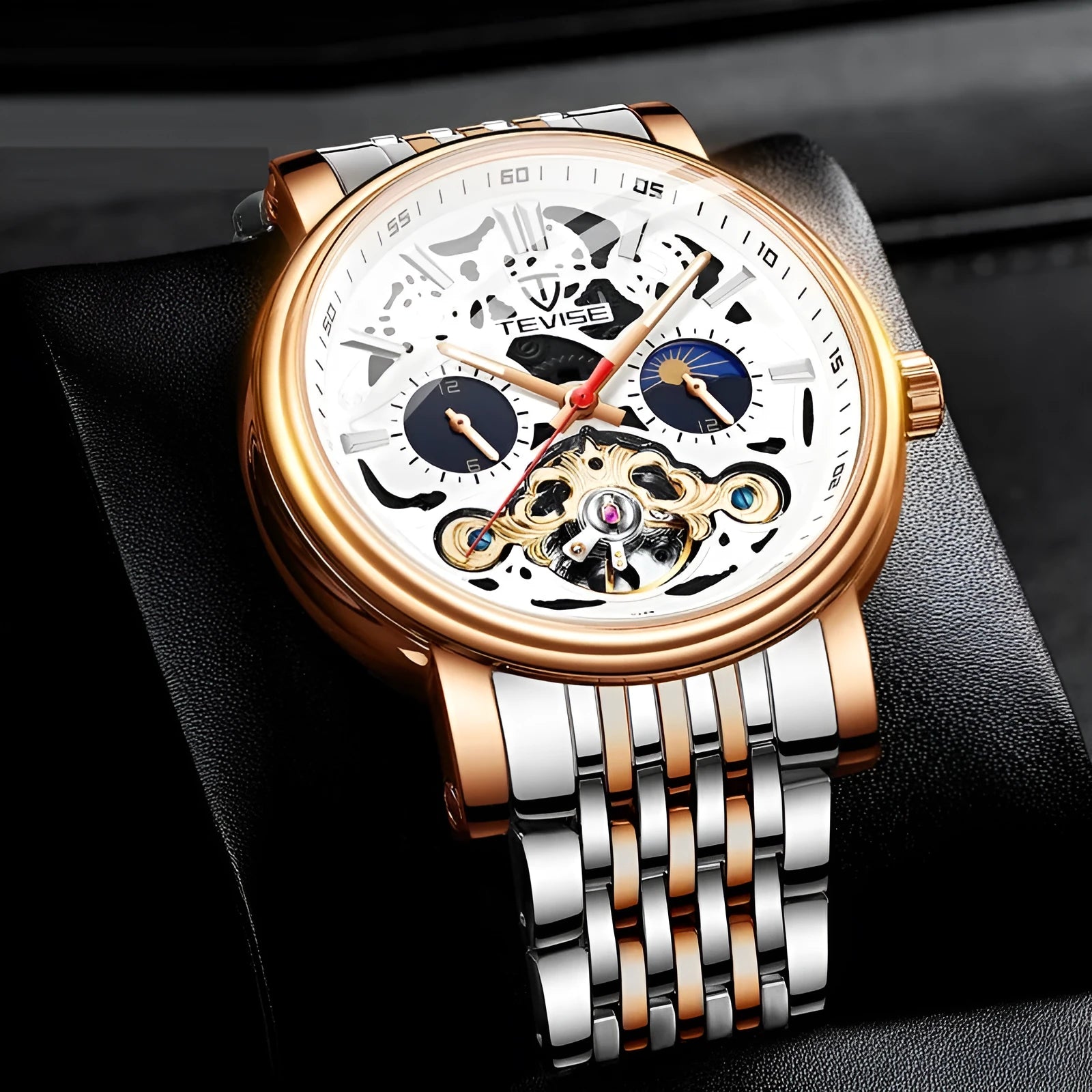 Men's black mechanical wristwatch with tourbillon detail and luminous hands on a leather strap.