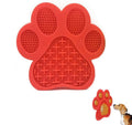Blue silicone dog licking mat with bone texture and suction cups on a white background.