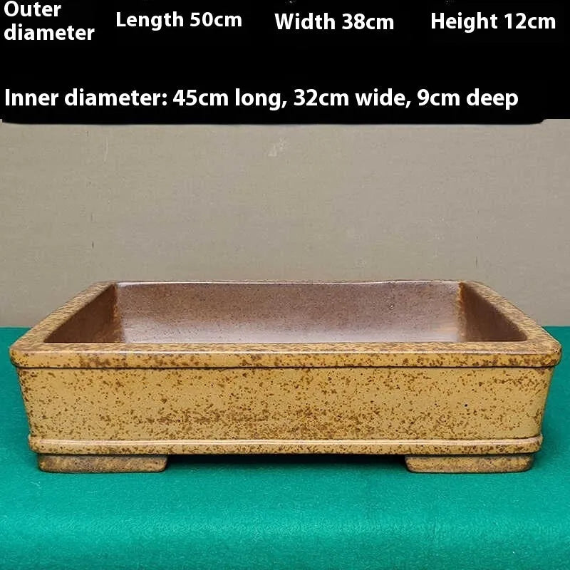 Straight shallow rectangular Yixing Fine Zisha flowerpot in purple sand clay for corridor plant display.
