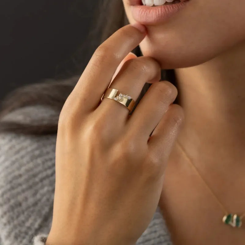 Gold electroplated copper ring with shining zircon stone available in sizes 6 to 10