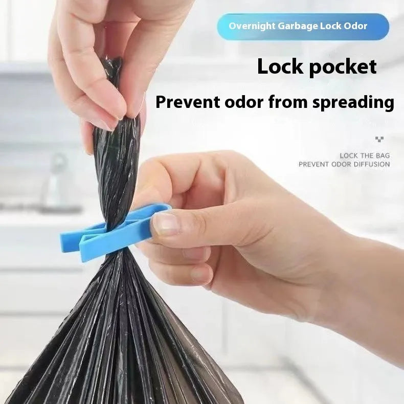 White plastic rubbish bag clip with adjustable 16mm jaws for securing bin liners.