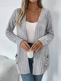 Solid color long sleeve cardigan knitwear with pockets in Grandma Grey or Black polyester blend loose fit