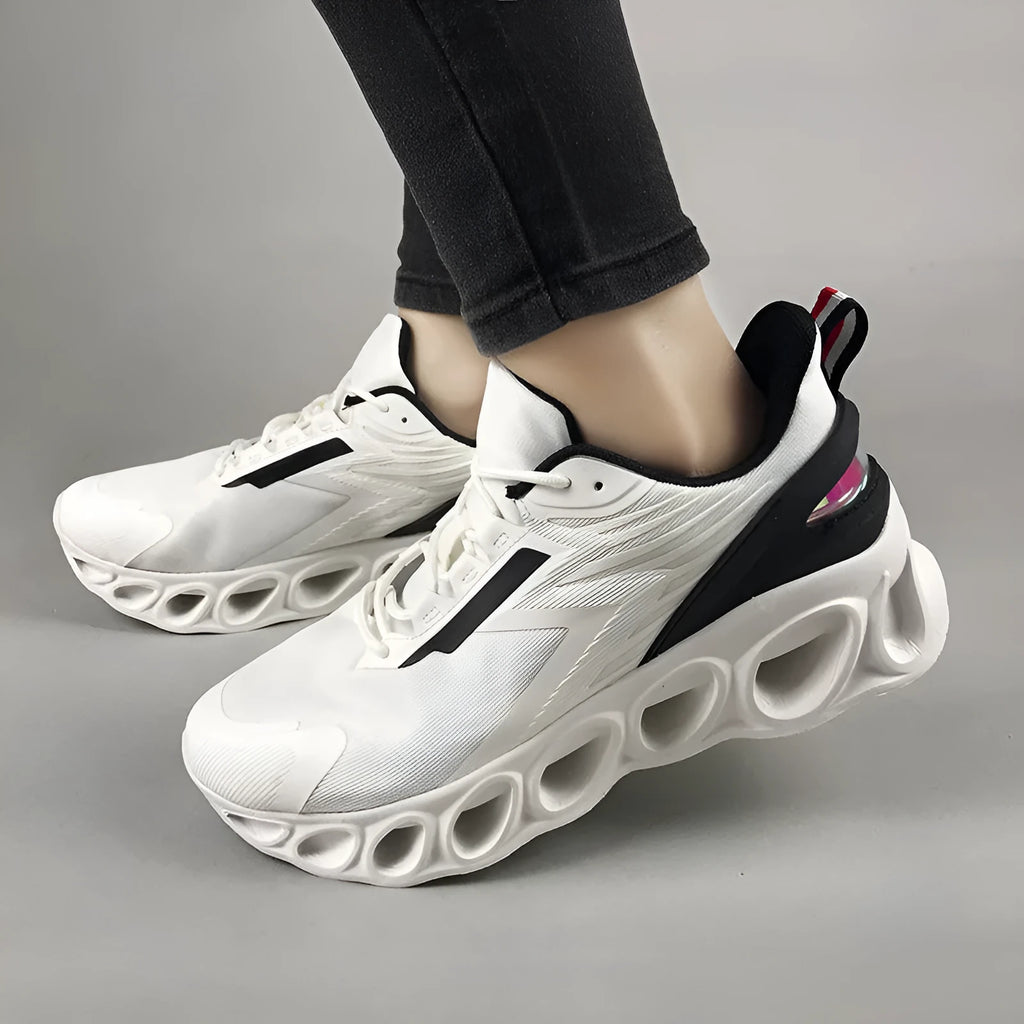 Men's casual sports shoes with mesh upper in black colour showing lace-up front and EVA sole