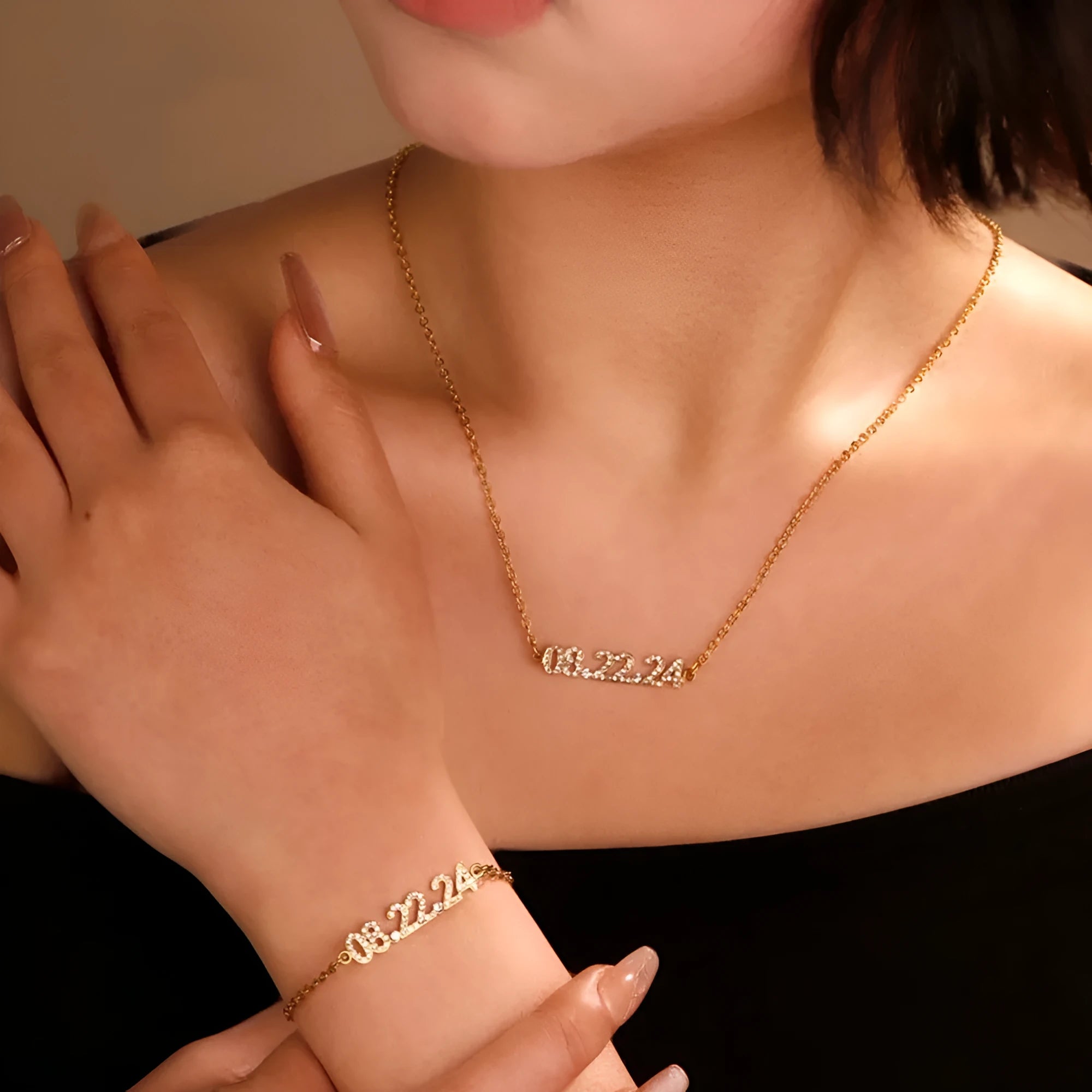 Stainless steel digital bracelet with diamond studded numbers in gold finish.