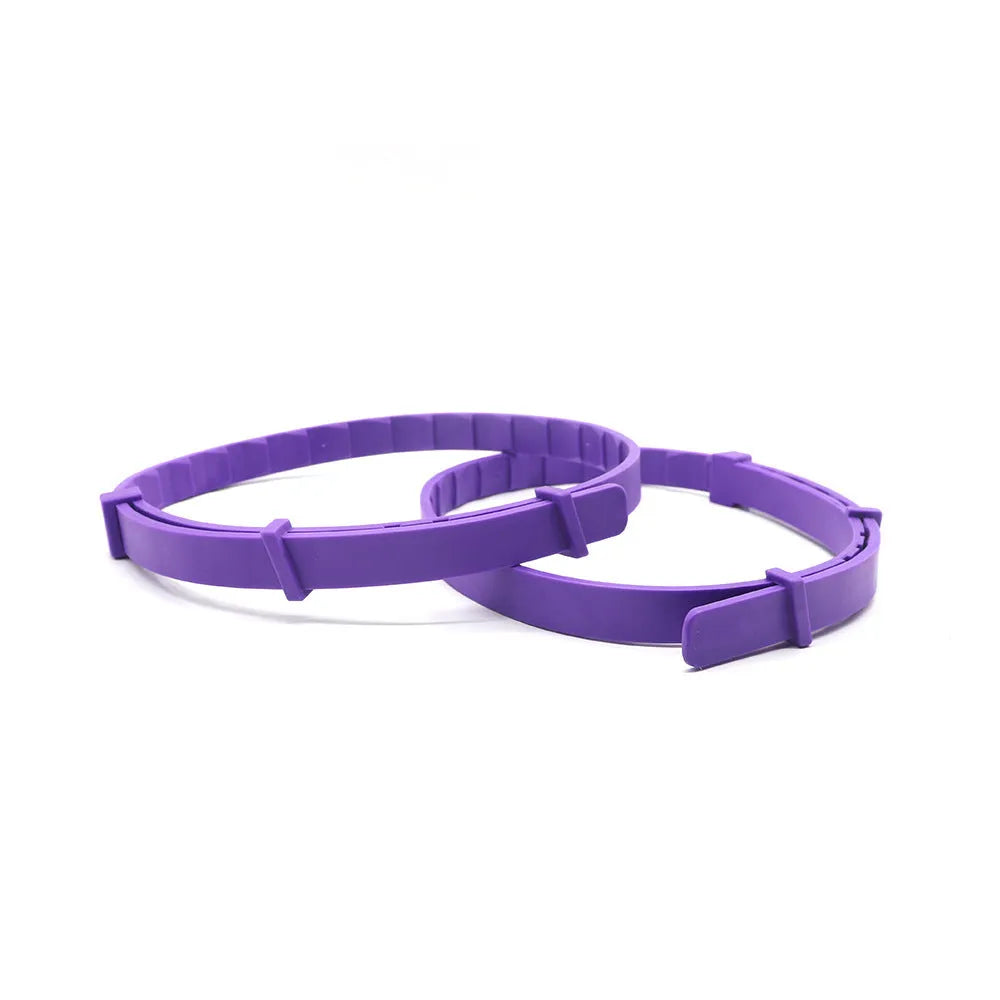 Four dog anxiety relief collars in different colours with monochrome Chinese style pattern