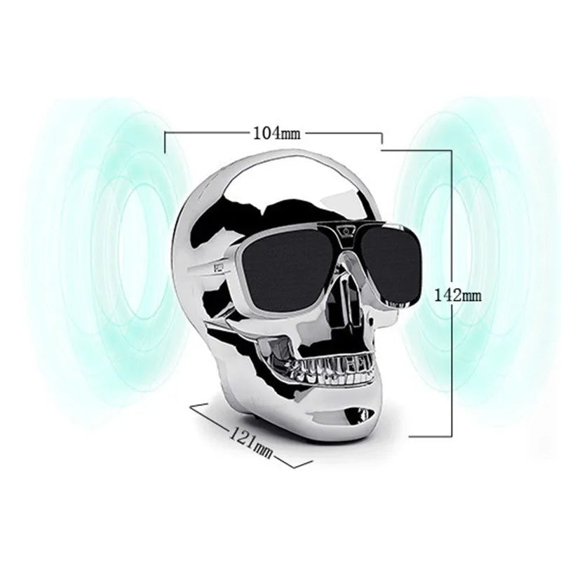 Skull-shaped wireless Bluetooth speaker showing front view with controls and available colour options