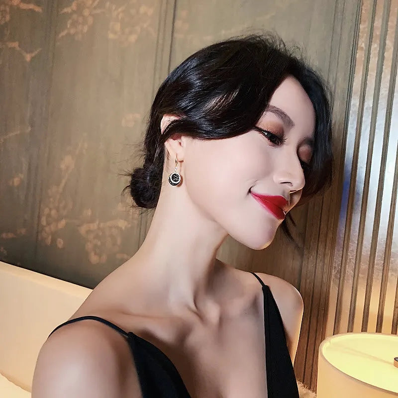Black geometric round alloy earrings with retro Hong Kong style, 3.6cm long.