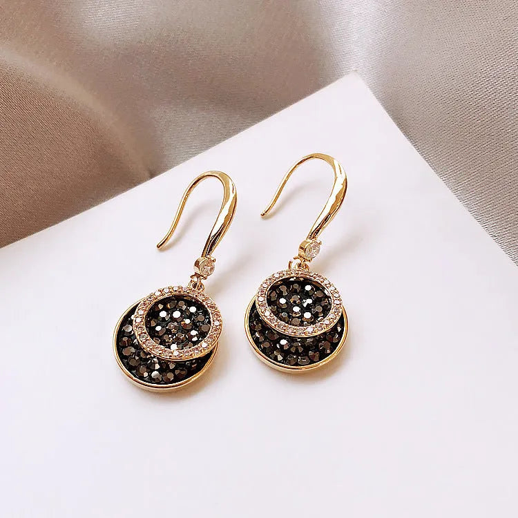 Black geometric round alloy earrings with retro Hong Kong style, 3.6cm long.