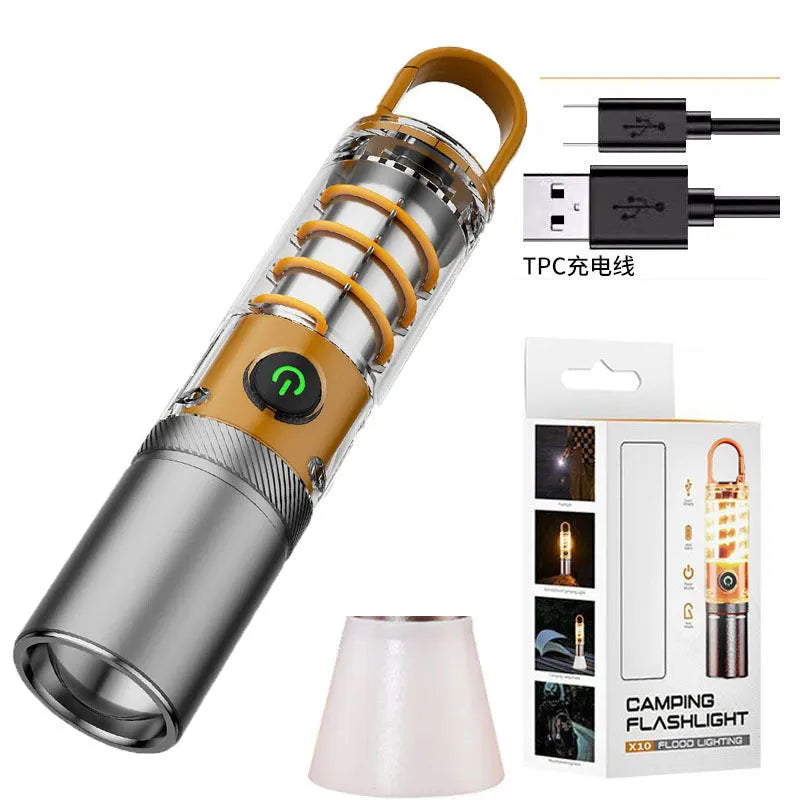 Orange and beige dual light source flashlight with hook and optical zoom ring