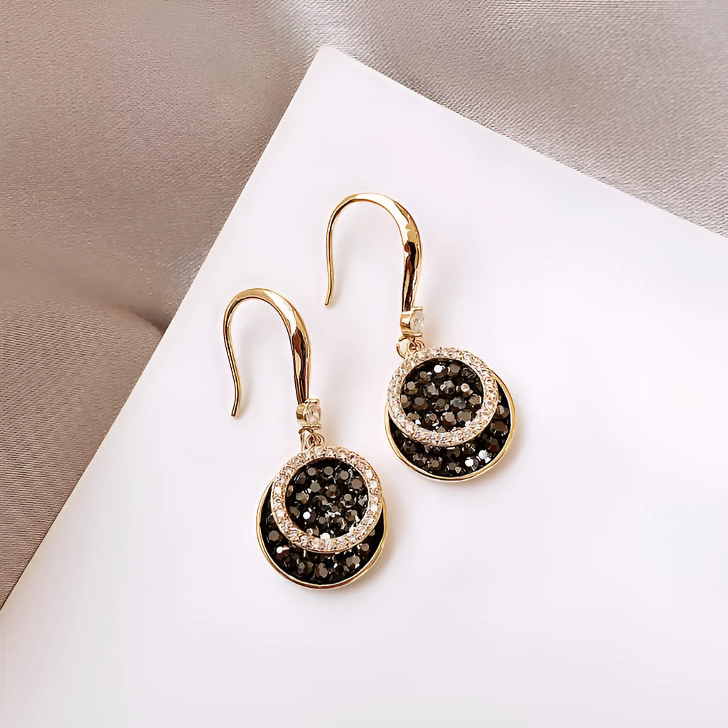 Black geometric round alloy earrings with retro Hong Kong style, 3.6cm long.