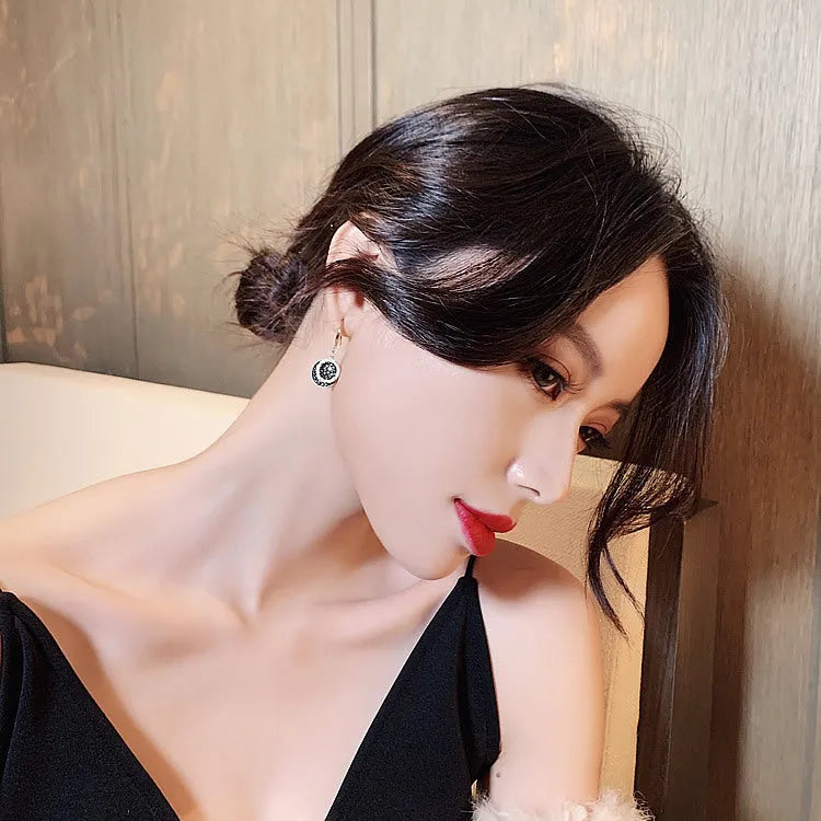 Black geometric round alloy earrings with retro Hong Kong style, 3.6cm long.