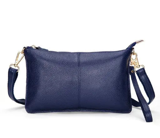 Lady cowhide slant bag in apricot showing top layer leather texture and dual straps
