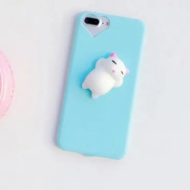Soft pink TPU iPhone case with a raised white 3D cartoon cat design on the back.